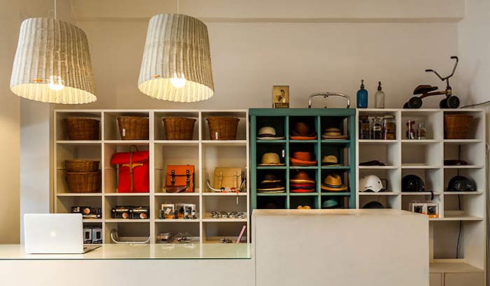 工業元素自行車店鋪前臺背景墻裝修設計案例效果圖